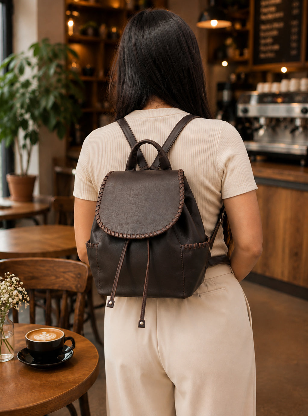 Concealed Carry Allie Leather Backpack in Gray – worn by model 2