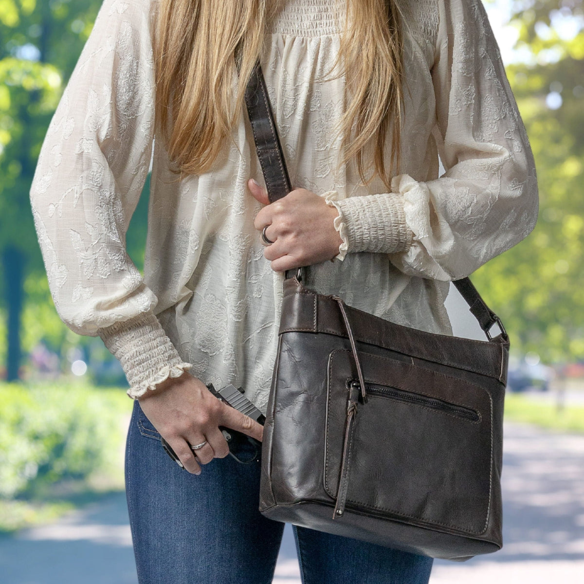 Delaney Concealed Carry Crossbody in Dark Mahogany – worn by model