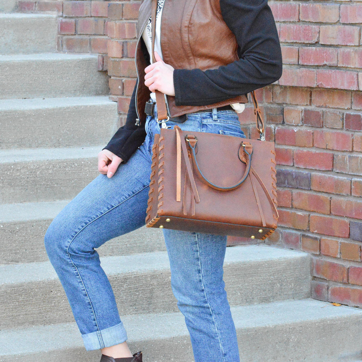 Concealed Carry Emma Leather Satchel in Distressed Brown – worn by model