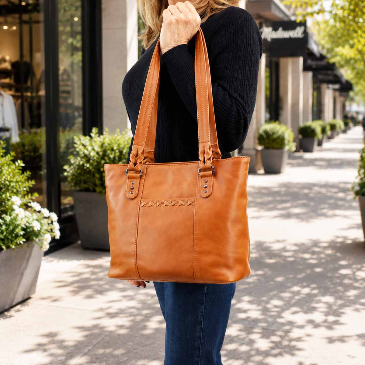 Peyton Leather Concealed Carry Tote in Caramel – worn by model 2