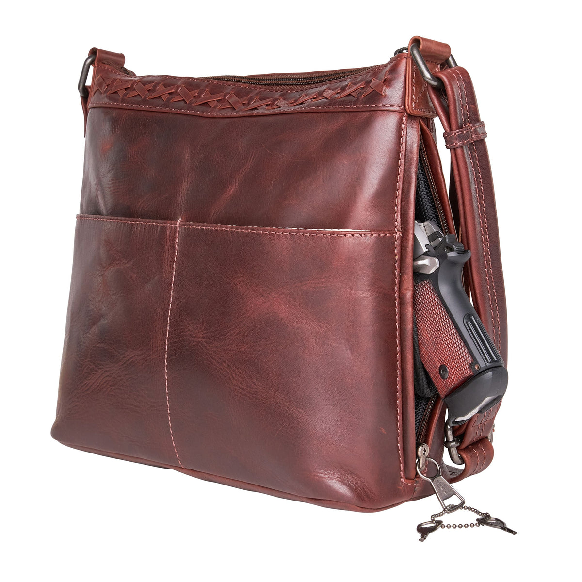 Faith Concealed Carry Crossbody in Dark Mahogany – shown with handgun
