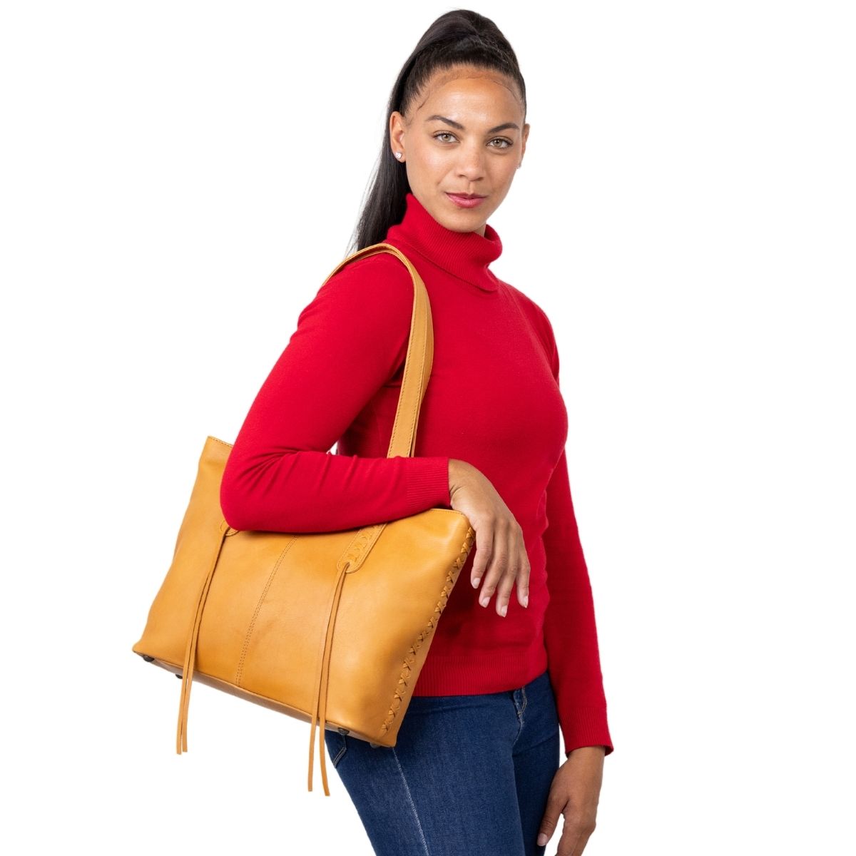Concealed Carry Norah Leather Tote in Caramel – worn by model 3