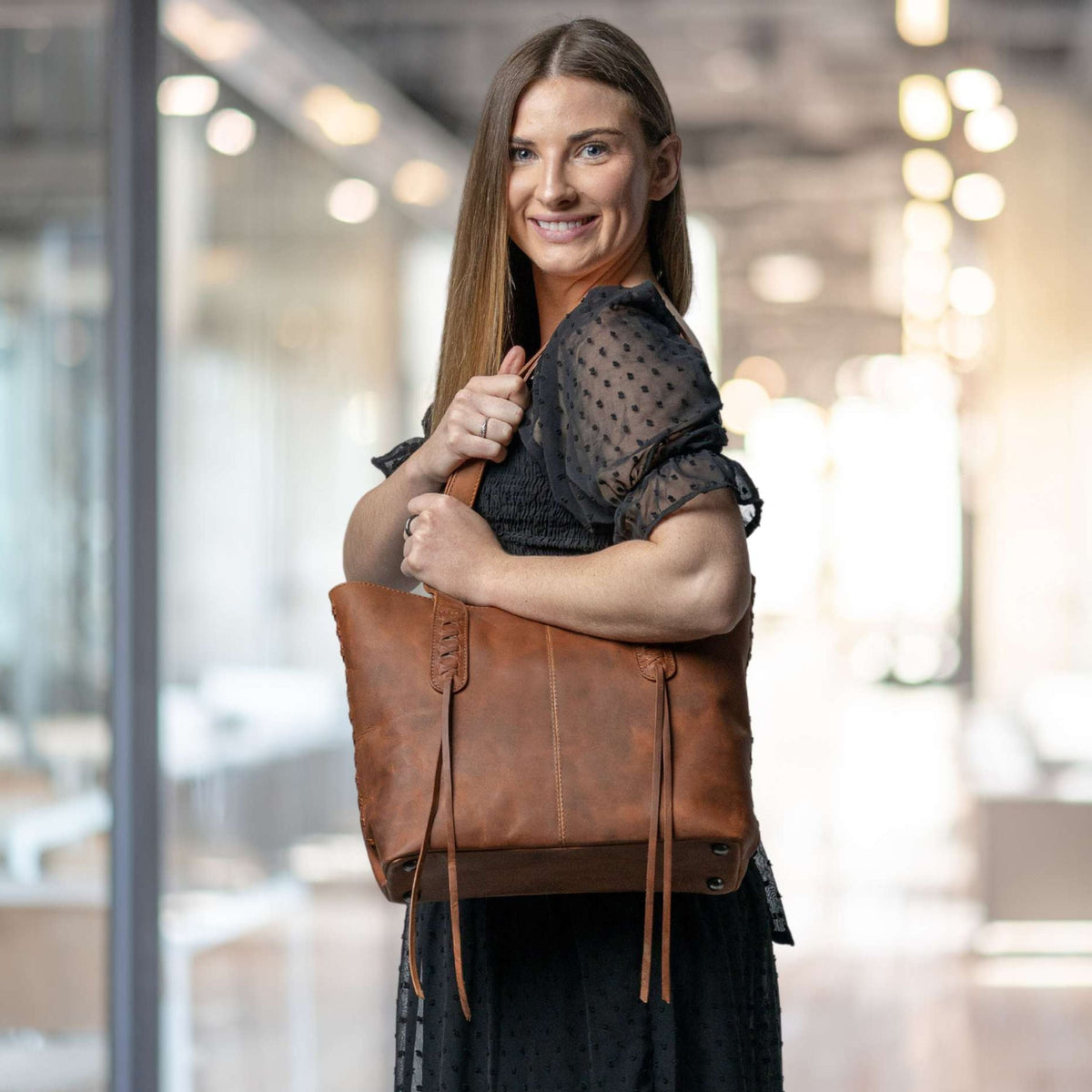 Concealed Carry Reagan Medium Leather Tote in Cognac – worn by model