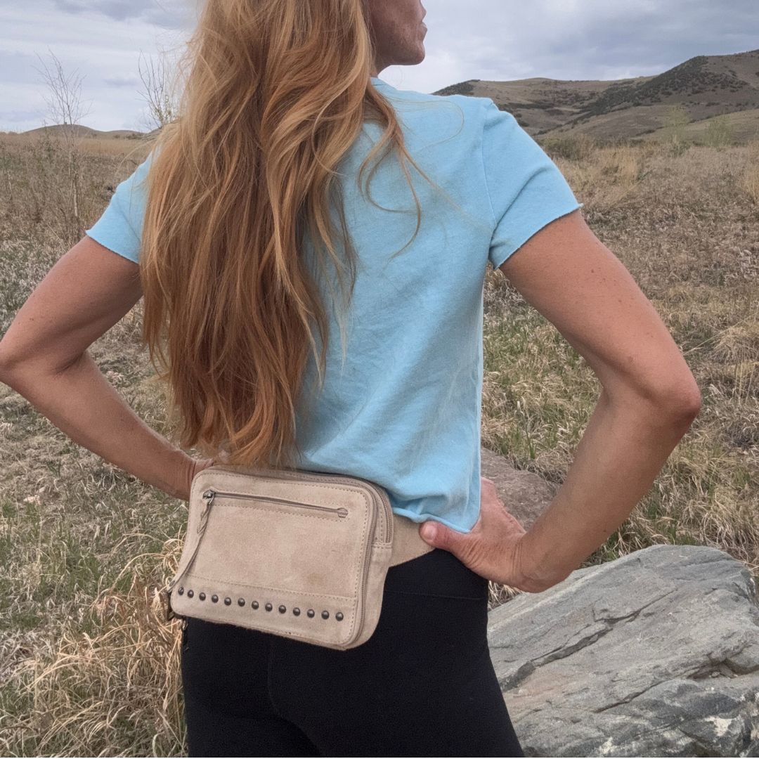 Concealed Carry Kailey Leather Fanny Pack/Sling in Cognac – worn by model 3