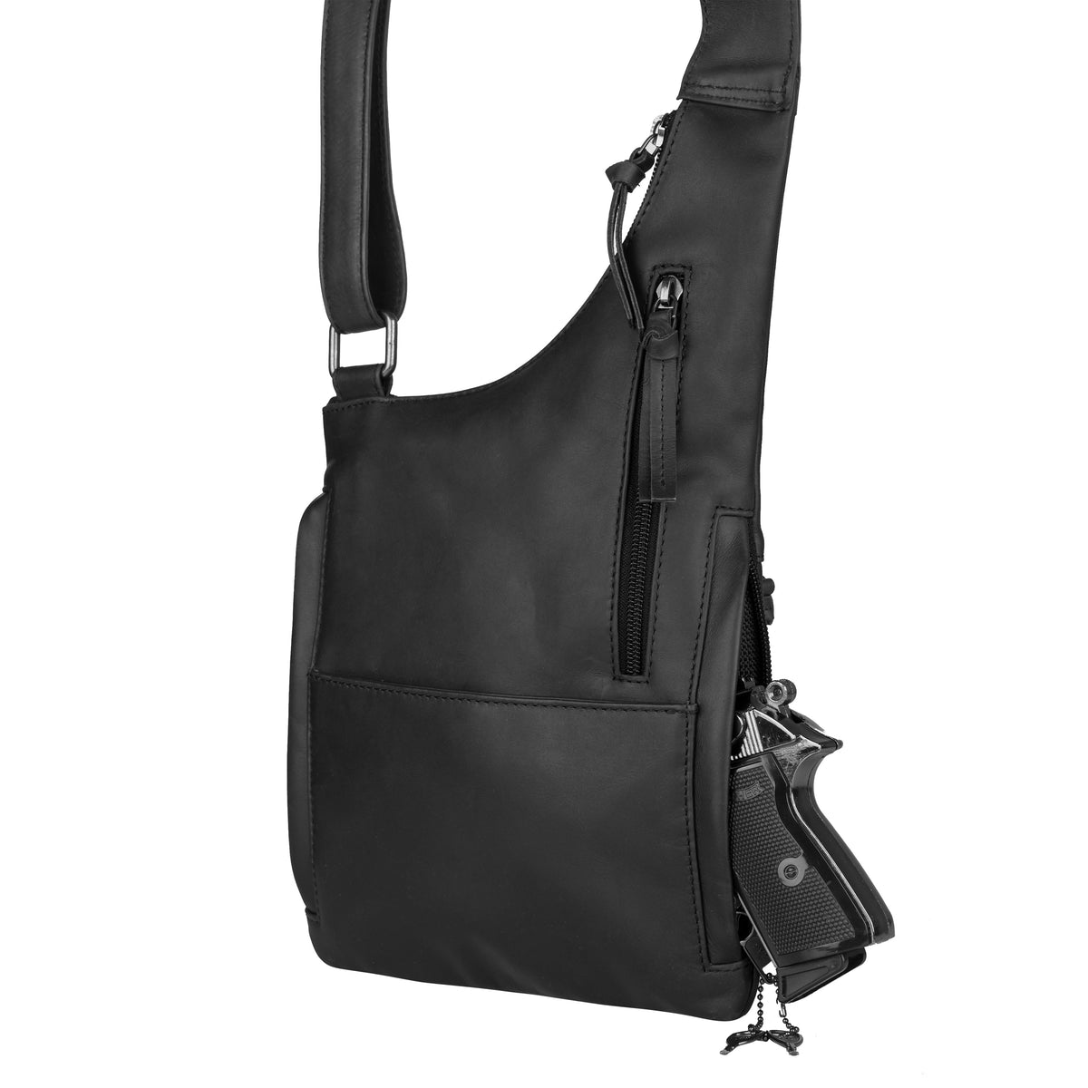 Concealed Carry Unisex Remi Leather Crossbody in Black – shown with handgun