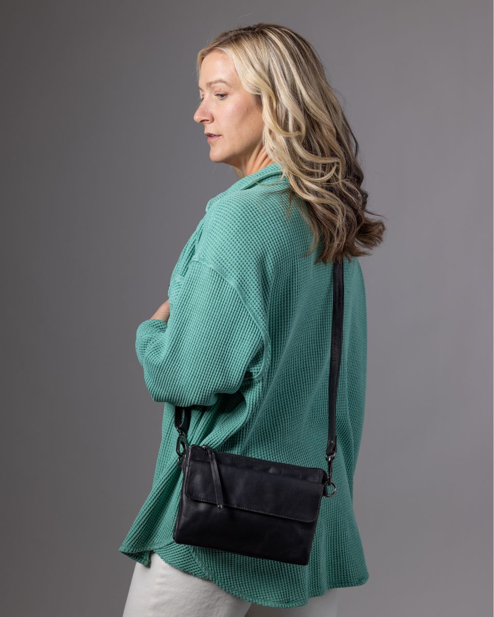 Premium Leather Concealed Carry Natasha Crossbody Bag in Black – worn by model 3