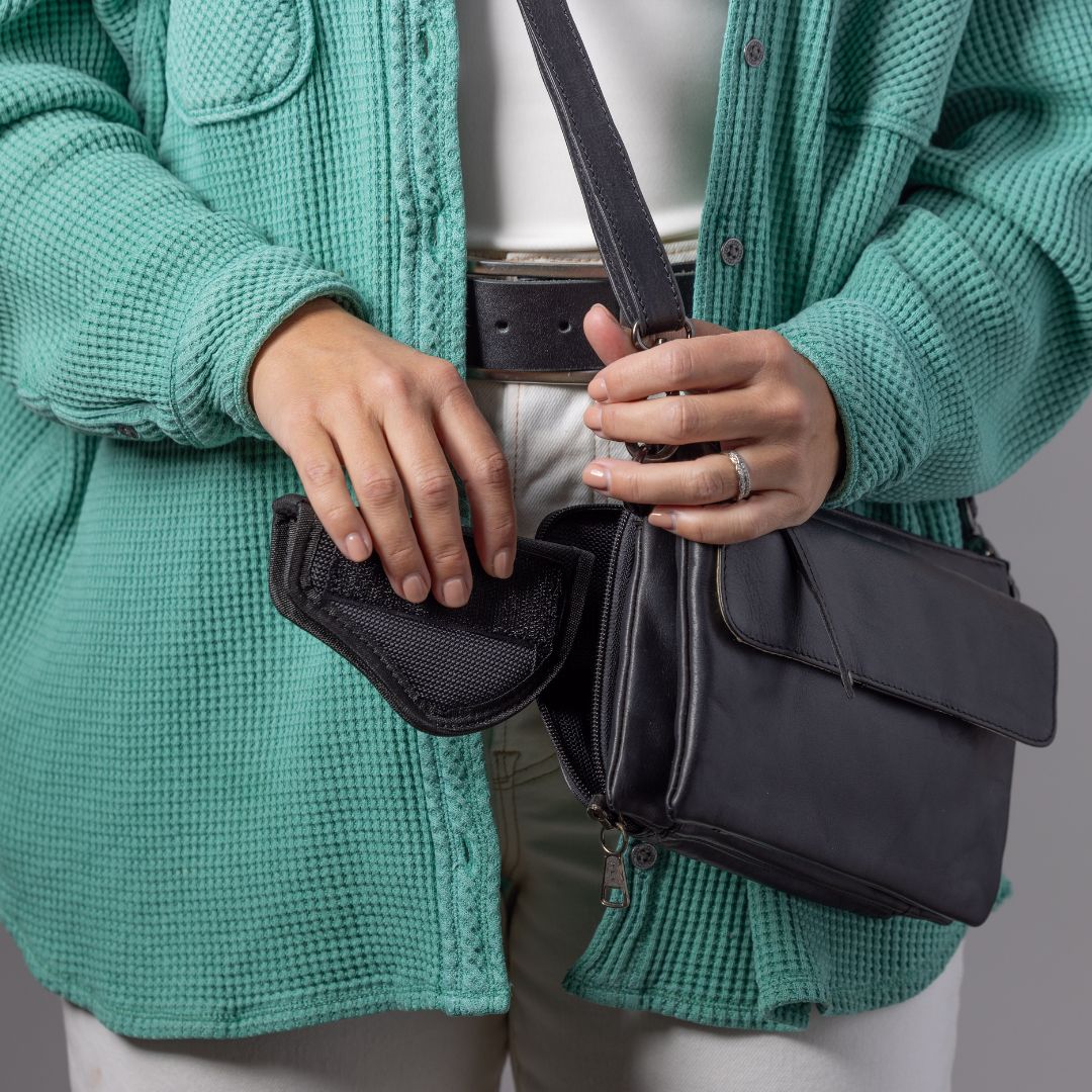 Premium Leather Concealed Carry Natasha Crossbody Bag in Black – worn by model 2
