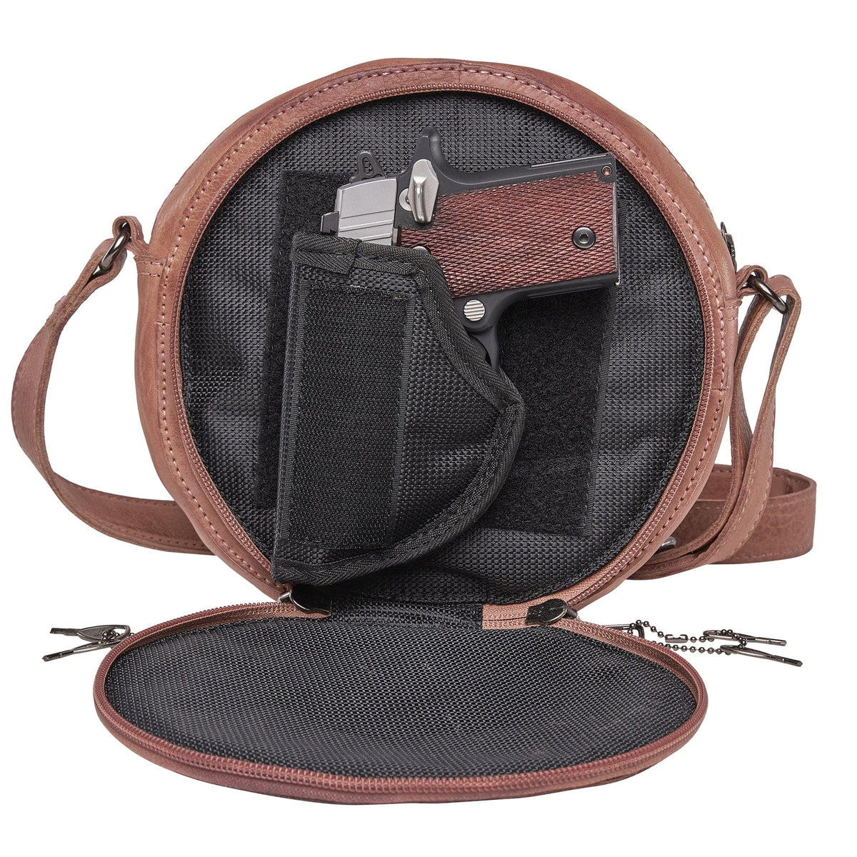 Women's Concealed Carry Mia Crossbody Purse in Blush – shown with handgun