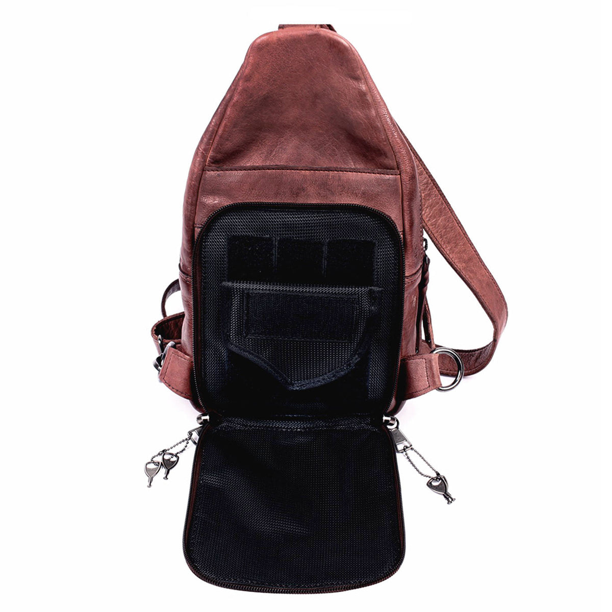 Concealed Carry Unisex Taylor Leather Sling Backpack in Dark Brown – shown with handgun 4