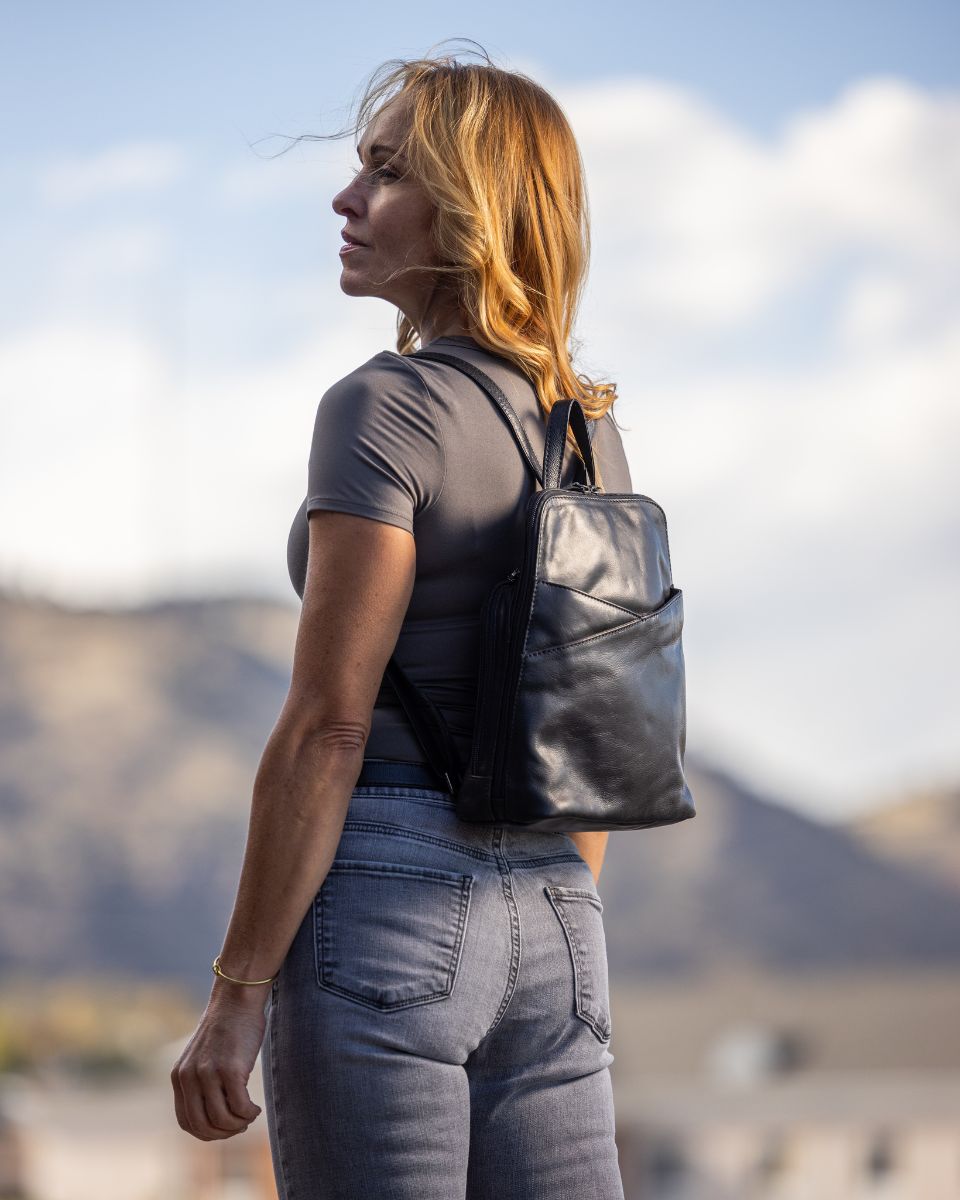 Concealed Carry Jayden Leather Backpack in Black – worn by model 3