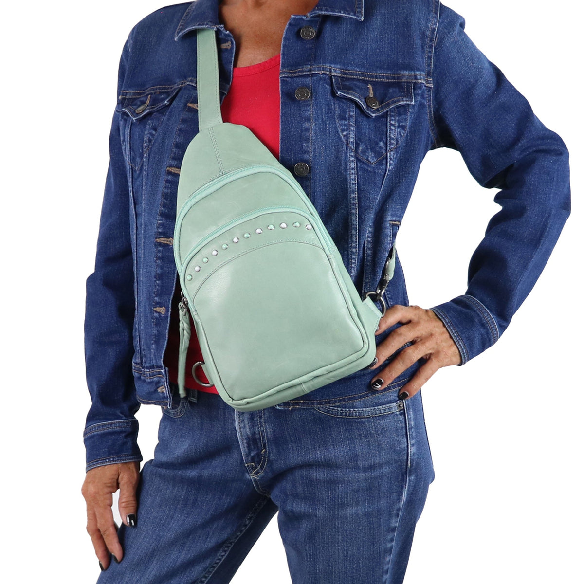 Concealed Carry Haven Sling Leather Backpack in Mint – worn by model 2