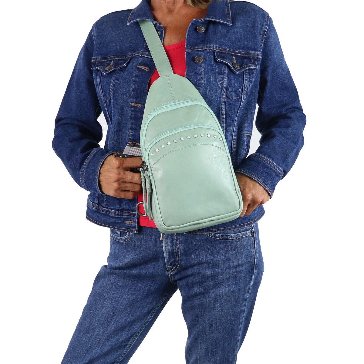 Concealed Carry Haven Sling Leather Backpack in Mint – worn by model