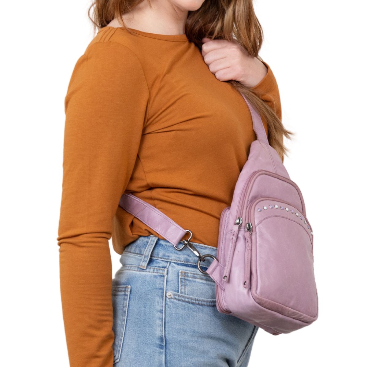 Concealed Carry Haven Sling Leather Backpack in Lilac – worn by model 2