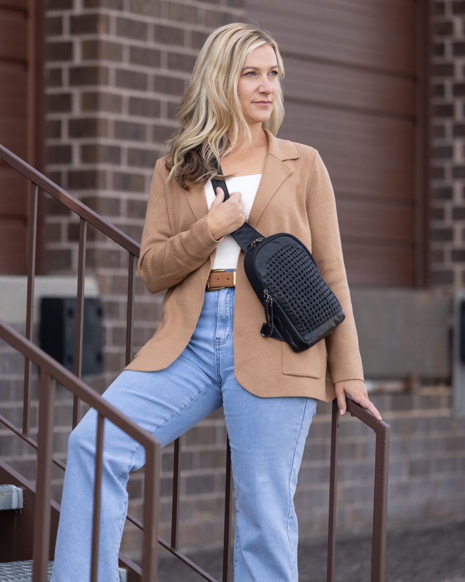 Concealed Carry Bristol Sling Leather Backpack in Black – worn by model