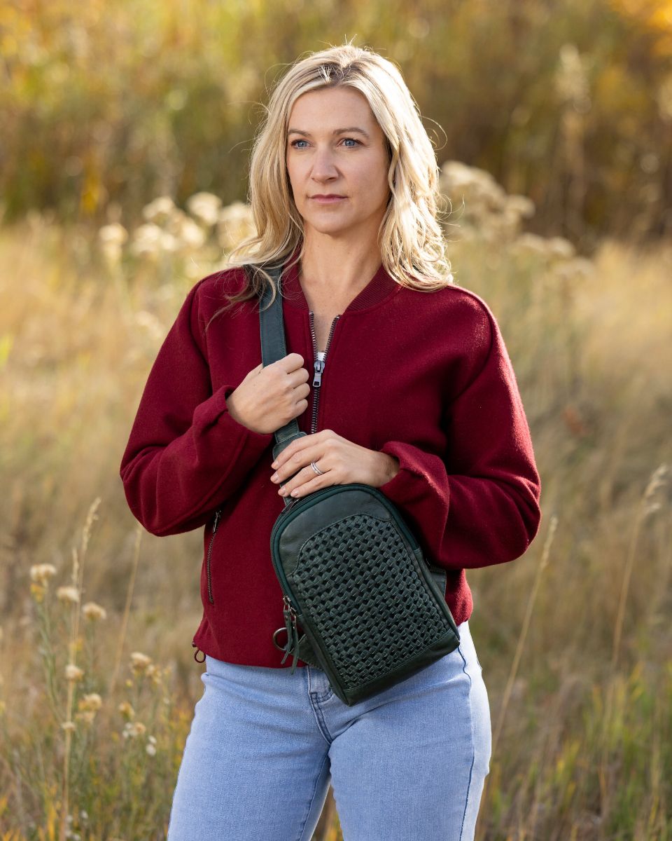 Concealed Carry Bristol Sling Leather Backpack in Forest Green – worn by model