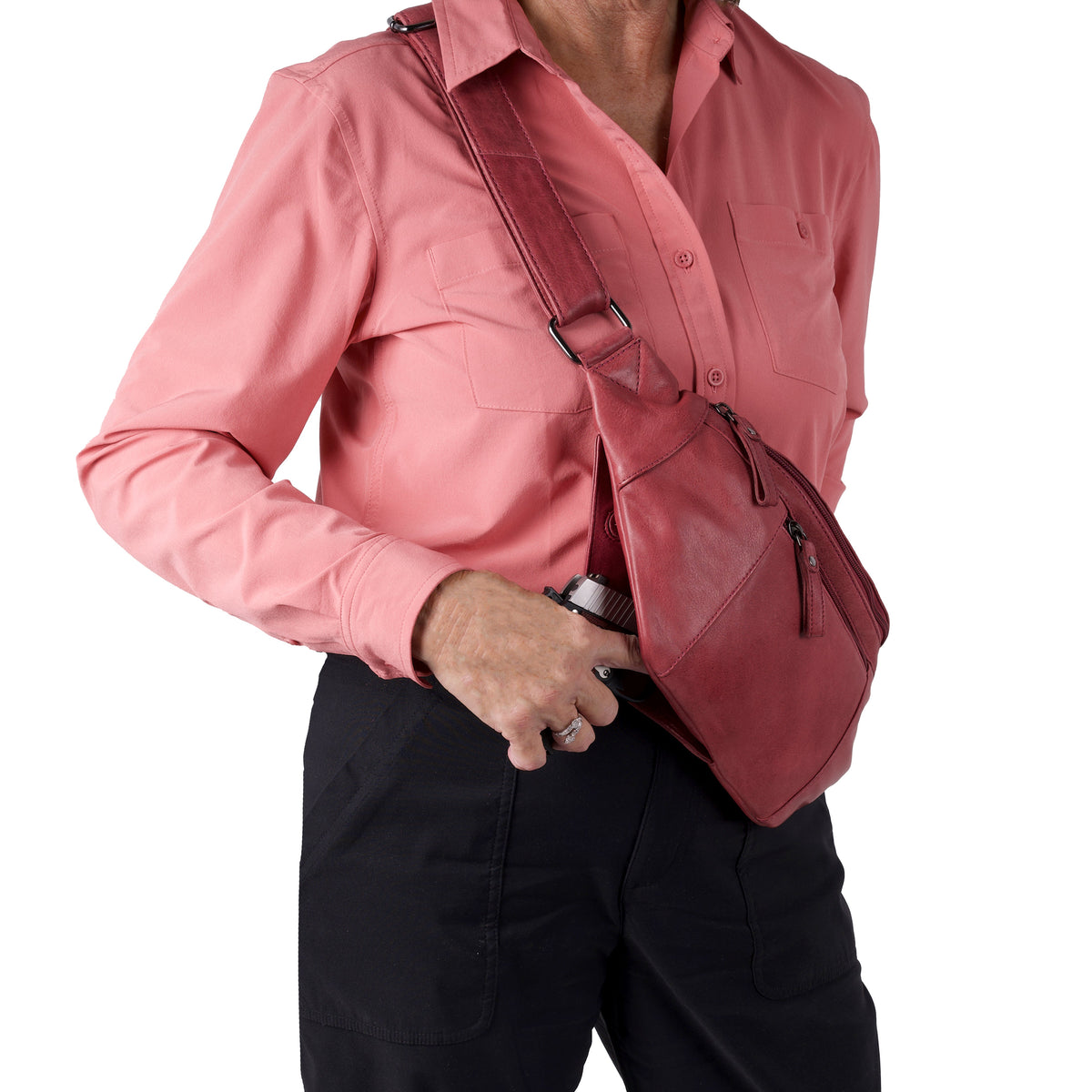 Concealed Carry Charlie Magnetic Leather Sling in Plum – worn by model 2