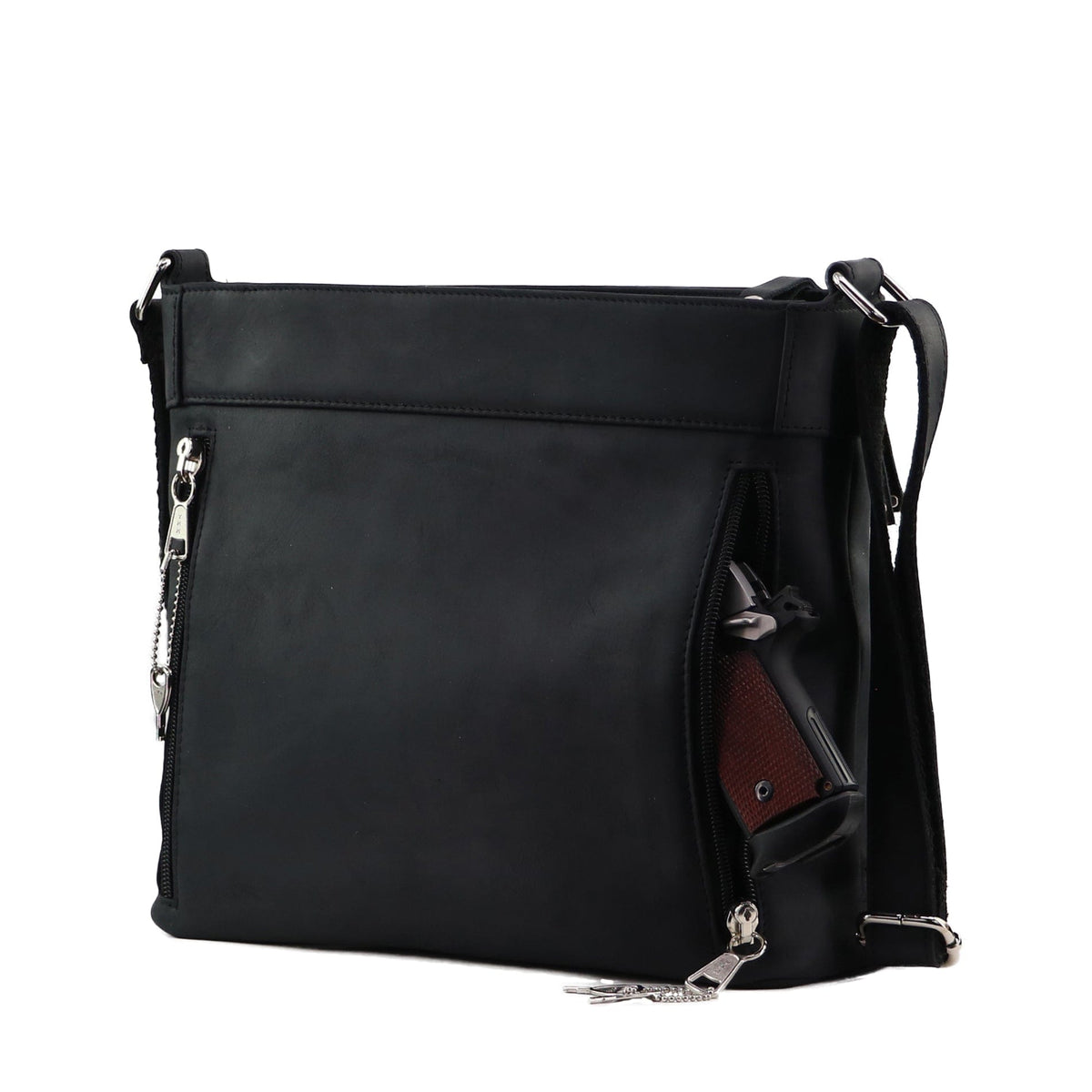 Delaney Concealed Carry Crossbody in Dark Mahogany – shown with handgun 2