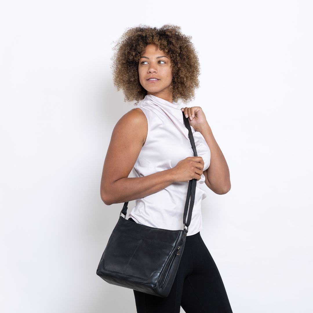 Concealed Carry Lydia Leather Crossbody in Cognac – worn by model 3
