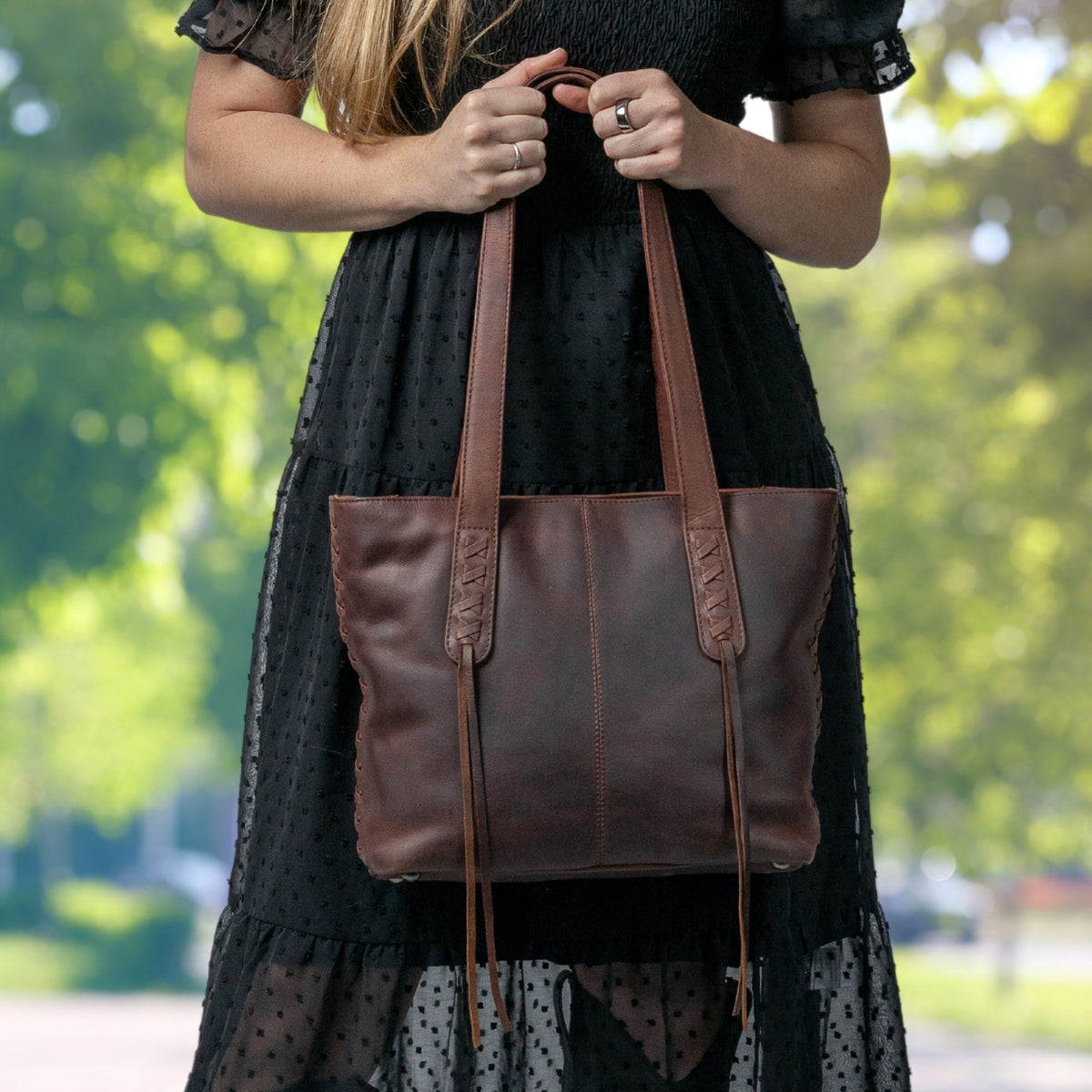 Concealed Carry Reagan Medium Leather Tote in Dark Mahogany – worn by model